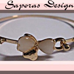 Gold Tone Bangle Bracelet With Bow & Heart Design White Beads & Clear Crystals